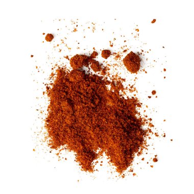 Beyaz arka plana dağılmış kırmızı biber tozu fotoğrafı