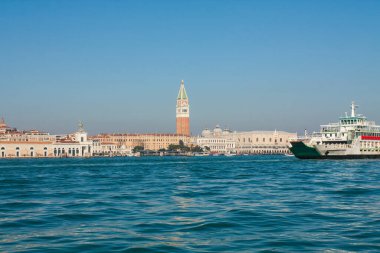 Doges palace and St. Marco tower from water, Venice, Italy.