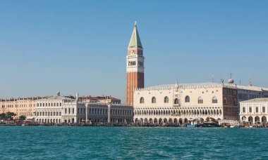 Doges palace, Library and St. Marco tower from water, Venice, Italy.
