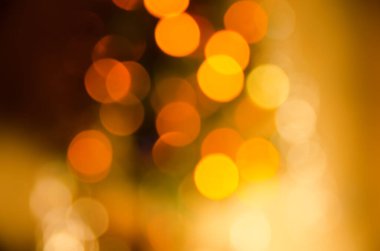 Bulanık çelenk ışıklarının soyut Noel arkaplanı