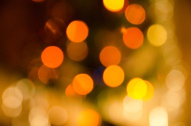 Bulanık çelenk ışıklarının soyut Noel arkaplanı