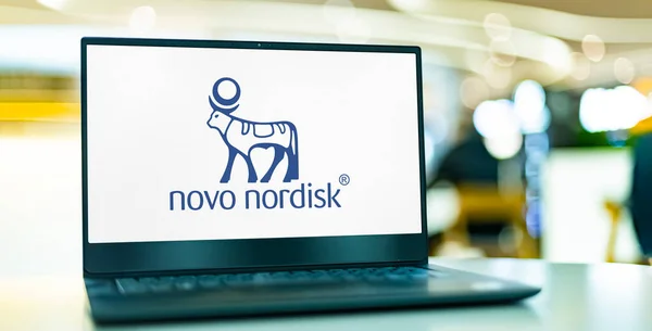 stock image POZNAN, POL - OCT 28, 2022: Laptop computer displaying logo of Novo Nordisk, a multinational pharmaceutical company headquartered in Bagsvard, Denmark