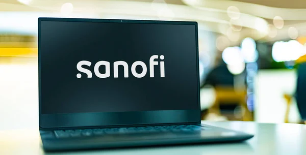 stock image POZNAN, POL - OCT 28, 2022: Laptop computer displaying logo of Sanofi, a pharmaceutical and healthcare company headquartered in Paris, France