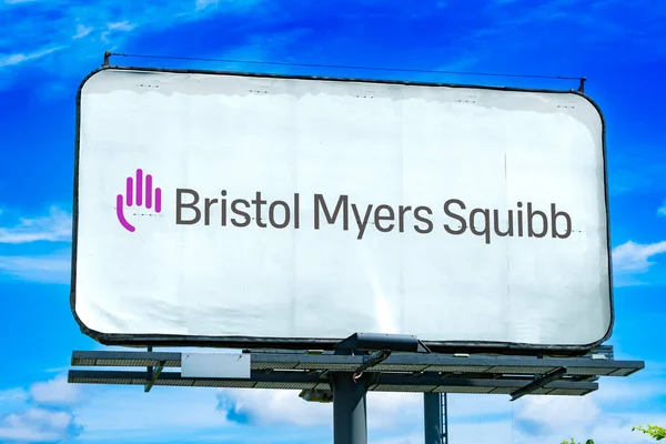 stock image POZNAN, POL - OCT 28, 2022: Advertisement billboard displaying logo of The Bristol-Myers Squibb Company, a multinational pharmaceutical company headquartered in New York City