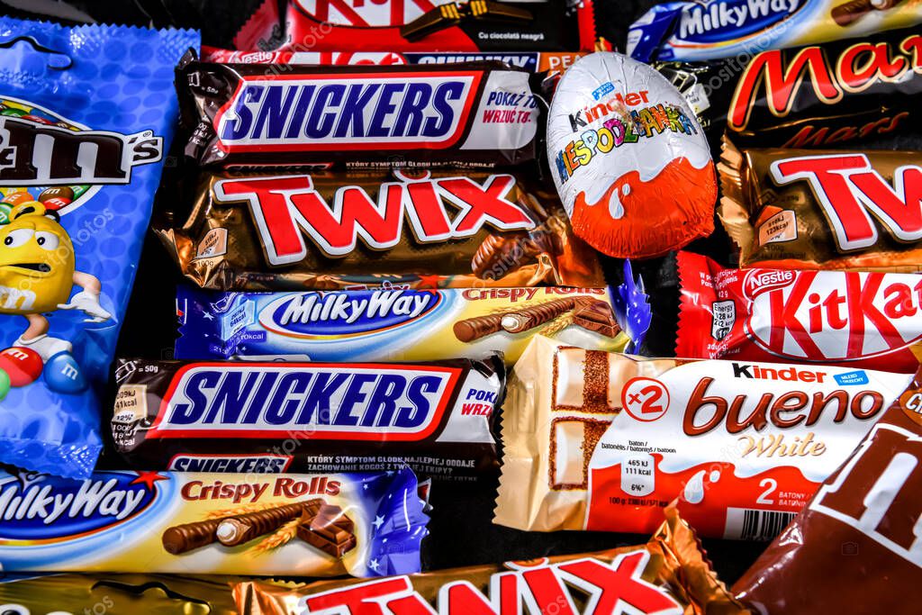 POZNAN, POL - NOV 25, 2022: Variety of popular brands of confectionery products