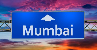 Road sign indicating direction to the city of Mumbai.