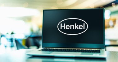 POZNAN, POL - DEC 28, 2022: Laptop computer displaying logo of Henkel, a chemical and consumer goods company headquartered in Duesseldorf, Germany