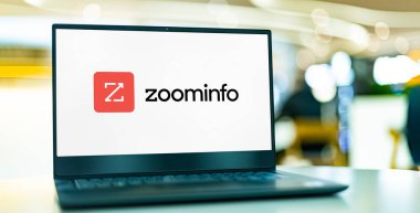 POZNAN, POL - DEC 28, 2022: Laptop computer displaying logo of  ZoomInfo Technologies, a software and data company which provides information and data for companies and business individuals