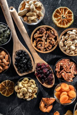 Composition with a variety of dried fruits and assorted nuts. Delicacies.