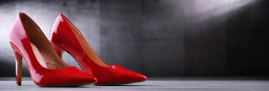 Composition with a pair of women's shoes.