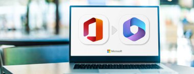 POZNAN, POL - JAN 19, 2023: Laptop computer displaying logos of Microsoft Office and Microsoft 365