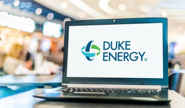 POZNAN, POL - JUL 20, 2022: Laptop computer displaying logo of Duke Energy Corporation, an electric power and natural gas holding company headquartered in Charlotte, North Carolina