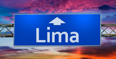 Road sign indicating direction to the city of Lima.