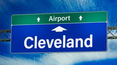 Road sign indicating direction to the city of Cleveland.