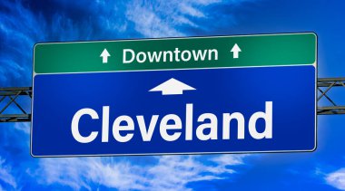 Road sign indicating direction to the city of Cleveland.