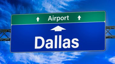 Road sign indicating direction to the city of Dallas.