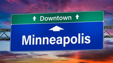 Road sign indicating direction to the city of Minneapolis.