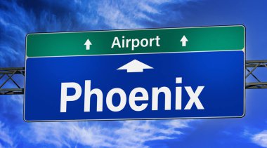 Road sign indicating direction to the city of Phoenix.