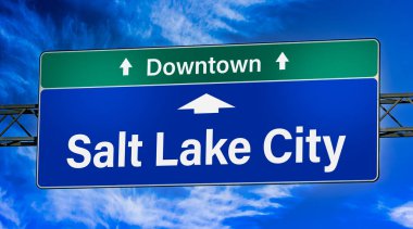 Road sign indicating direction to the city of Salt Lake City.