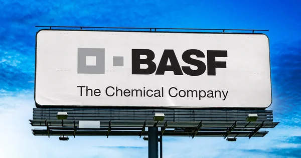 stock image POZNAN, POL - JAN 11, 2023: Advertisement billboard displaying logo of BASF, a chemical company and the largest chemical producer in the world, headquartered in Ludwigshafen, Germany.