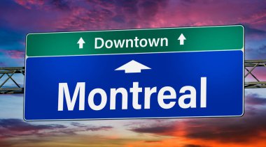 Road sign indicating direction to the city of Montreal.