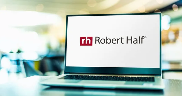 Stock image POZNAN, POL - FEB 21, 2023: Laptop computer displaying logo of Robert Half, a global human resource consulting firm based in Menlo Park and San Ramon, California, USA