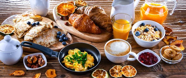 Breakfast Served Coffee Orange Juice Scrambled Eggs Cereals Pancakes Croissants — 스톡 사진