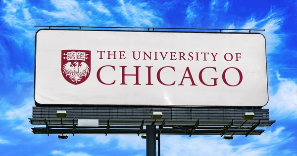 stock image POZNAN, POL - MAR 7, 2023: Advertisement billboard displaying logo of The University of Chicago, a private research university in Chicago, Illinois