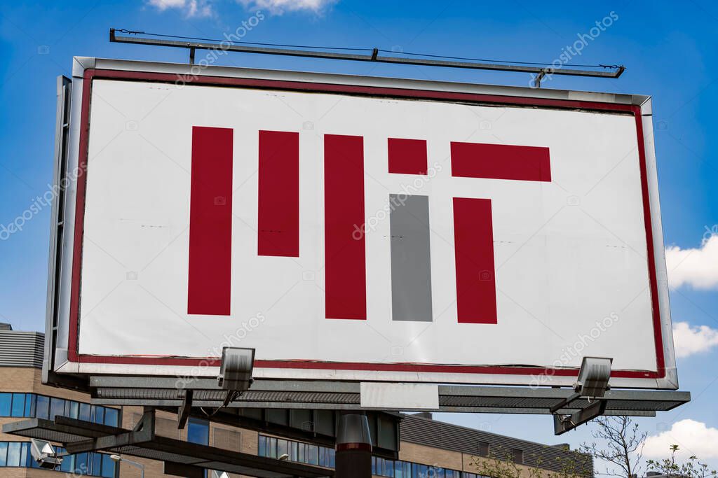 POZNAN, POL - MAR 7, 2023: Advertisement billboard displaying logo of Massachusetts Institute of Technology (MIT), a private land-grant research university in Cambridge, Massachusetts, USA