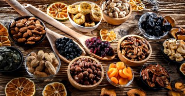 Composition with a variety of dried fruits and assorted nuts. Delicacies.