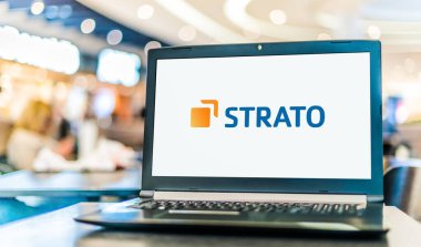 POZNAN, POL - FEB 25, 2022: Laptop computer displaying logo of Strato AG, an internet hosting service provider headquartered in Berlin, Germany