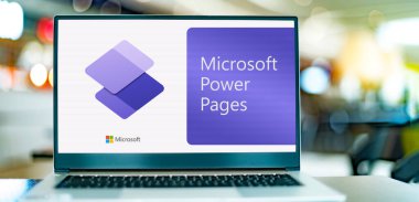 POZNAN, POL - MAR 21, 2023: Microsoft Power Pages 'in logosunu gösteren dizüstü bilgisayar, düşük kodlu web siteleri yapmak için grafiksel yazılım