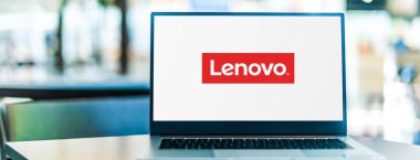 POZNAN, POL - SEP 23, 2020: Laptop computer displaying logo of Lenovo, a multinational technology company with headquarters in Beijing, China clipart