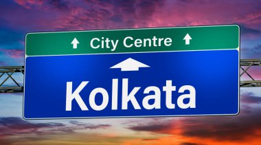 Road sign indicating direction to the city of Kolkata.