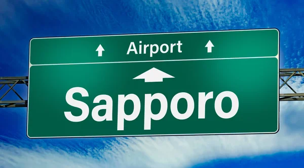 Road sign indicating direction to the city of Sapporo.