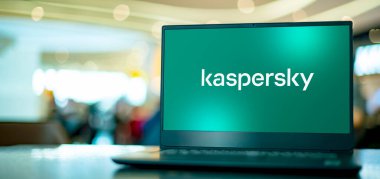 POZNAN, POL - APR 7, 2022: Laptop computer displaying logo of Kaspersky Lab, a multinational cybersecurity and anti-virus provider headquartered in Moscow, Russia clipart