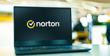 POZNAN, POL - APR 7, 2022: Laptop computer displaying logo of Norton AntiVirus, an anti-virus or anti-malware software product, developed and distributed by Symantec Corporation
