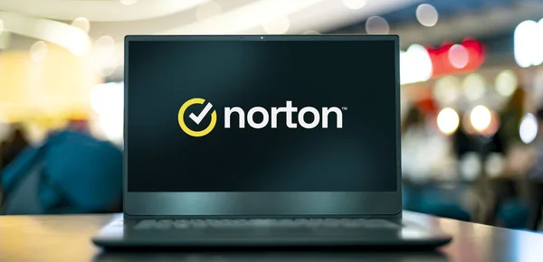 Stock image POZNAN, POL - APR 7, 2022: Laptop computer displaying logo of Norton AntiVirus, an anti-virus or anti-malware software product, developed and distributed by Symantec Corporation