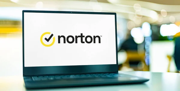 stock image POZNAN, POL - APR 7, 2022: Laptop computer displaying logo of Norton AntiVirus, an anti-virus or anti-malware software product, developed and distributed by Symantec Corporation