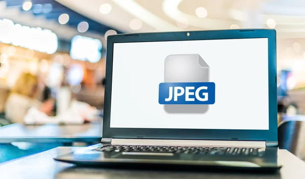 Jpegファイルのアイコンが表示されるノートパソコン — ストック写真