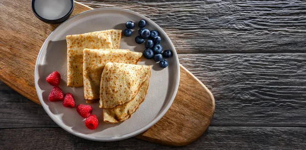 stock image A plate of home-made Polish pancakes filled with sweet cottage cheese