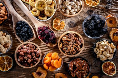 Composition with a variety of dried fruits and assorted nuts. Delicacies.