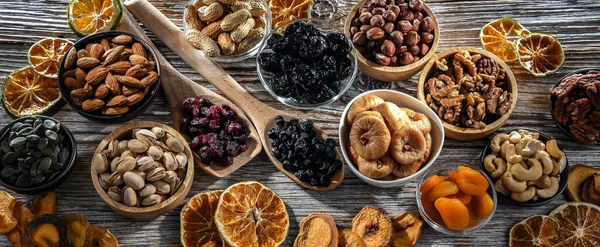 stock image Composition with a variety of dried fruits and assorted nuts. Delicacies.