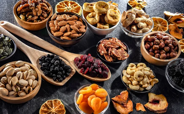 stock image Composition with a variety of dried fruits and assorted nuts. Delicacies.