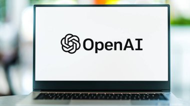POZNAN, POL - 16 Mayıs 2023: Amerika 'nın San Francisco, Kaliforniya, ABD' deki bir yapay zeka araştırma laboratuvarı olan OpenAI 'nin logosunu gösteren dizüstü bilgisayar