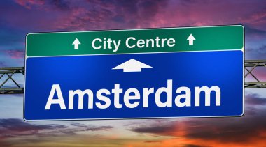 Road sign indicating direction to the city of Amsterdam.