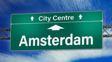 Road sign indicating direction to the city of Amsterdam.