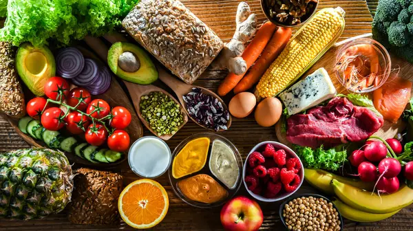 Una Variedad Productos Alimenticios Que Representan Una Dieta Equilibrada — Foto de Stock