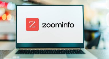 POZNAN, POL - DEC 28, 2022: Laptop computer displaying logo of  ZoomInfo Technologies, a software and data company which provides information and data for companies and business individuals
