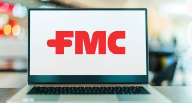 POZNAN, POL - DEC 28, 2022: Laptop computer displaying logo of FMC Corporation, a chemical manufacturing company based in Philadelphia, Pennsylvania